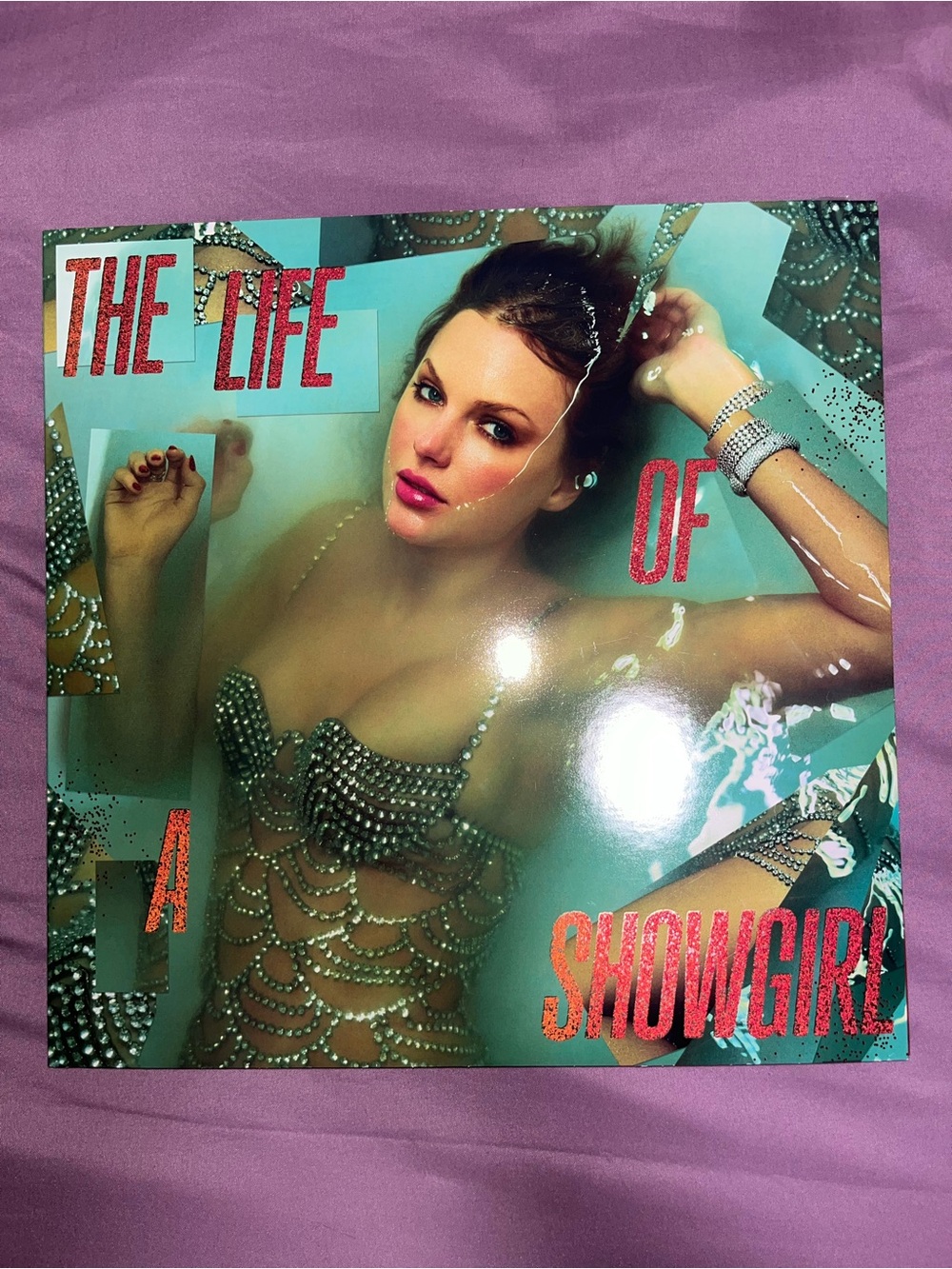 The Life of a Showgirl (Sweat and Vanilla Portofino Orange Glitter) Vinyl